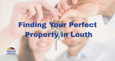 Hands with keys for new home with Michael Lavelle Estate Agents
