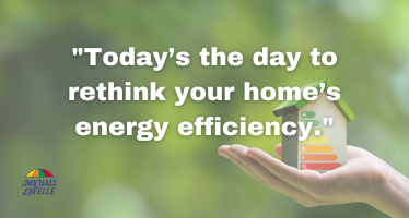 Hand holding a small house with BER ratings for energy efficiency